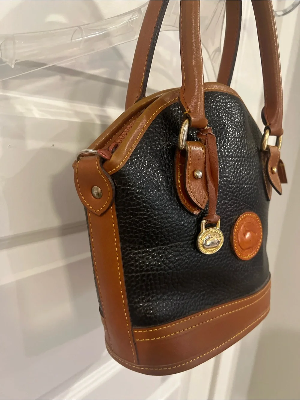 Dooney & Bourke Black with Brown Trim Pebbled Leather Satchel